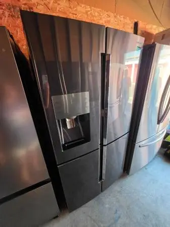 Samsung black stainless steel showcase 4 door refrigerator counter