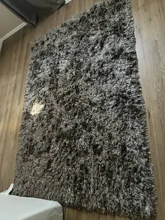 Rug 62 x 86.     Close to 5 x7