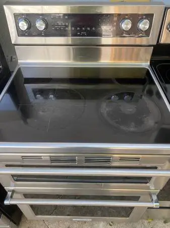 KitchenAid electric stove delivered and installed?