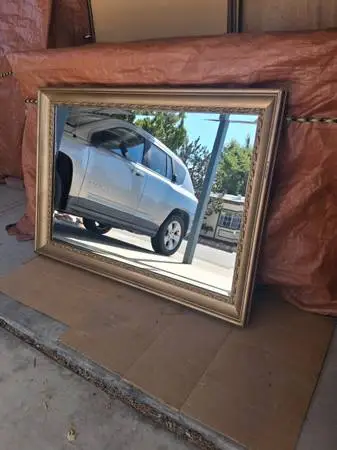 Quality gold tone wall mirror