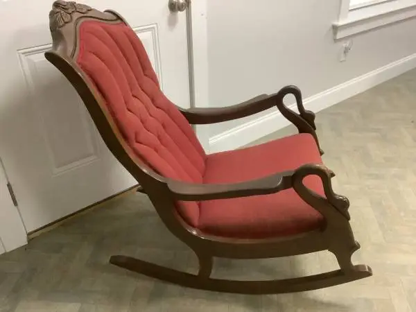 Vintage carved wood upholstered rocking chair