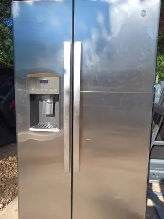 Stainless Side x side refrigerator like Brand new 8 months warranty