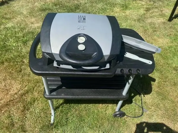 George Foreman electric grill with rolling stand
