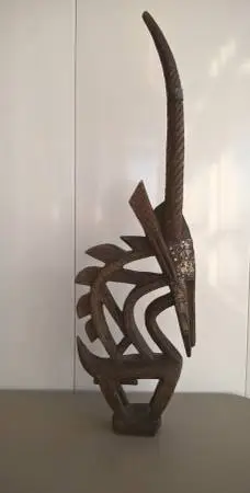 Chiwara ceremonial headdress carved wood hammered metal Mali Africa