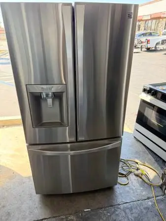 Counter depth stainless steel refrigerator and bottom freezer