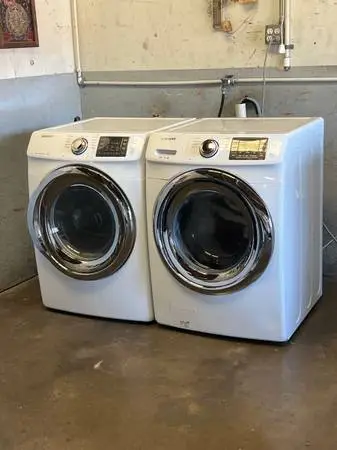 SAMSUNG FRONT LOAD STEAM WASHER AND ELECTRIC DRYER