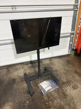 28” TV with rolling TV stand
