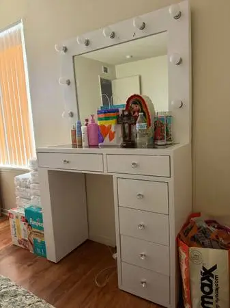 Vanity with lights and outlet plug in!