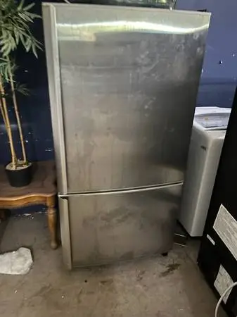 Stainless steel bottom drawer refrigerator.