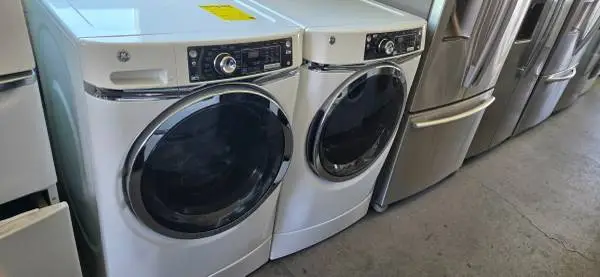 G.E STEAM TECHNOLOGY FRONT LOADER WASHER N DRYER SET WARRANTY N DELIVE
