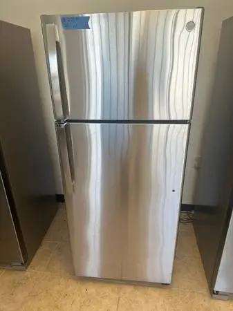 GE Stainless Steel Top & Bottom 28” W Refrigerator 713-376-0356