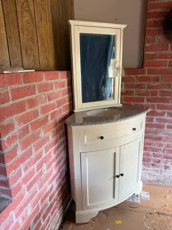 Corner bathroom vanity w/granite and matching mirror cabinet