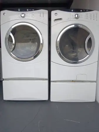 GE FRONTLOAD WASHER DRYER WITH PEDESTALS