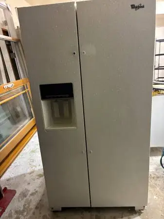Used refrigerator 36 inch 28 cu ft by Whirlpool in beige