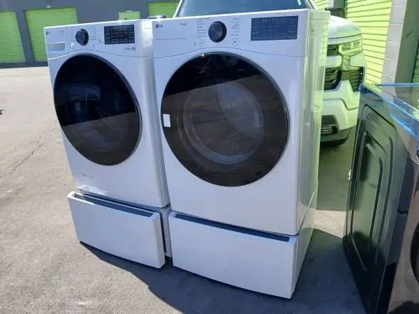 New lg thinq steam white front load washer and gas dryer Pedestal incl