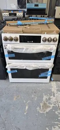 Brand new GE Cafe double oven 6 burner gas range