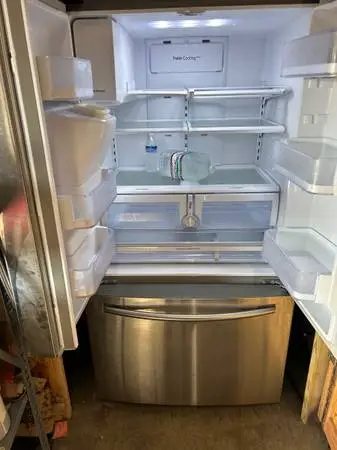 Stainless steel refrigerator with bottom freezer