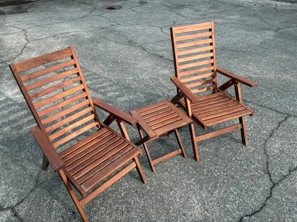 Patio set, two wooden foldable chairs with table.