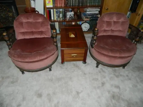 2 round swivel chairs.