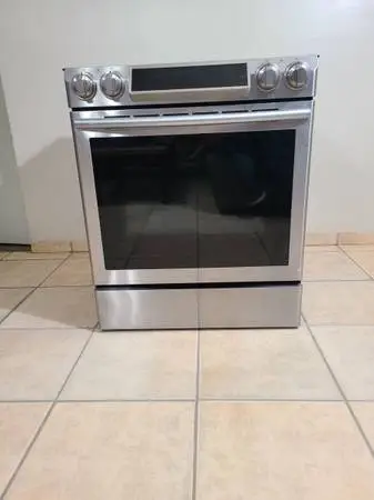 Stainless Steel Samsung electric stove 5 burner and conventional oven