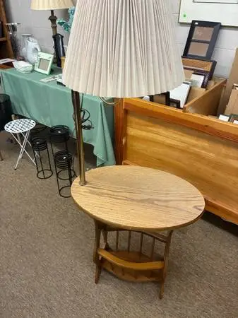 Vintage wood end table with attached swivel brass lamp