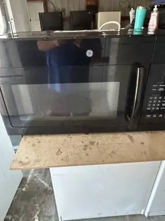 GE 30 inch over the stove microwave great condition