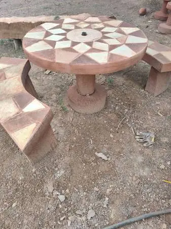 Rock table with pedestal and benches
