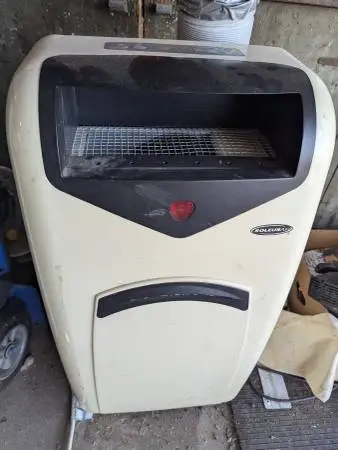 Portable AC blows cold air