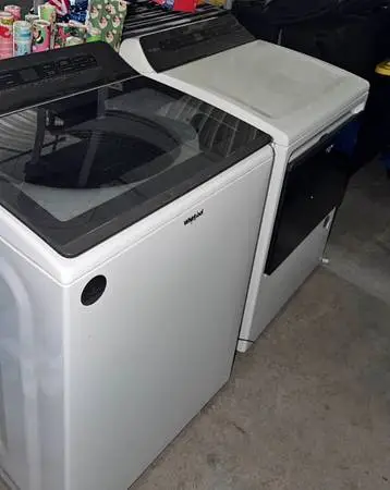 White Whirlpool washer and dryer gas