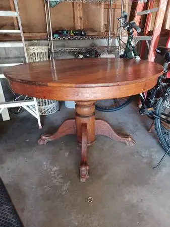 Antique clawfoot oak dining table