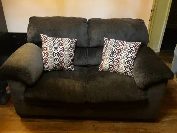 Good Condition Cozy 2-3 Person Couch with 2 Decorative Pillows
