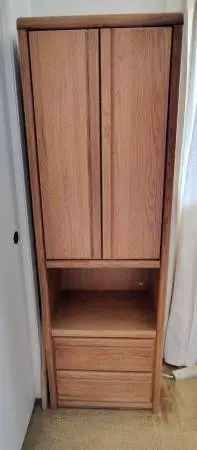 Two tall cabinets my mom used for storing fabric and sewing equipment