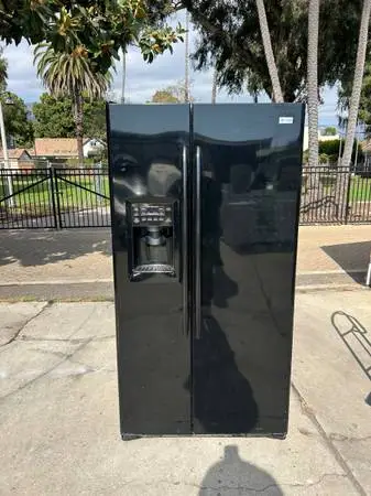 Warranty/GE profile fridge 36”cools great  free delivery