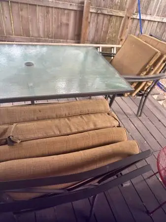 Glass patio table set, 4 chairs with cushions, umbrella ready