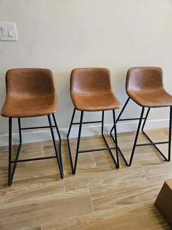 Chairs NEW 3 available Bar height really nice light brown color