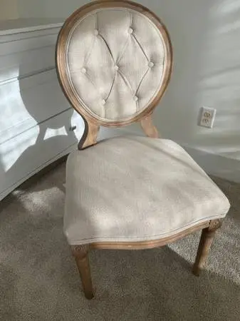 Single accent chair in ivory