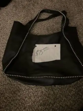 New black leather purse
