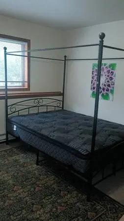 Queen canopy frame and mattress -like new