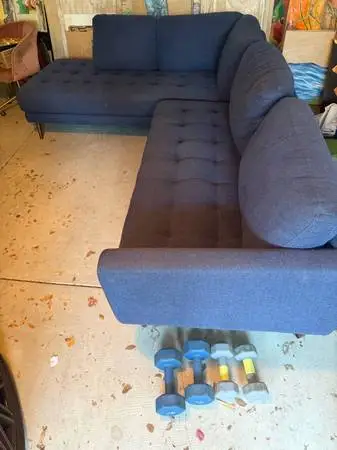 navy blue quilted L shape couch