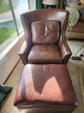 Brown Leather Chair with XL faux leather Ottoman.