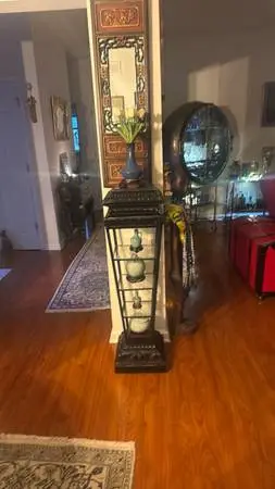 Beautiful tall decorative display stand with an elegant black finish, detailed d
