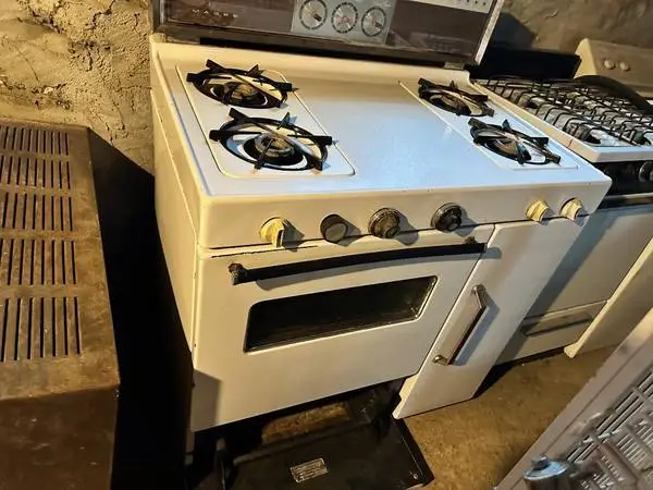 Two gas on gas stoves One McGee