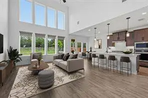Backed to a serene greenbelt in Headwaters,