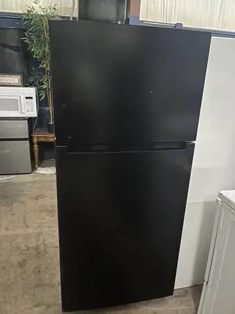 Black top and bottom refrigerator.