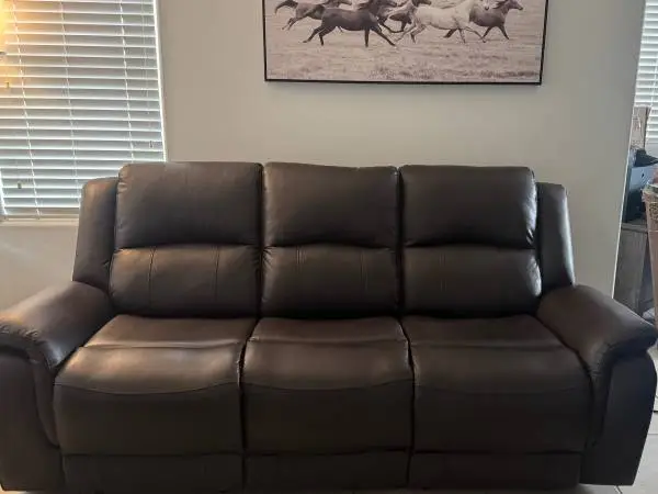 Brown Faux Leather Recliner. 3 seater couch with 2 Recliners each end