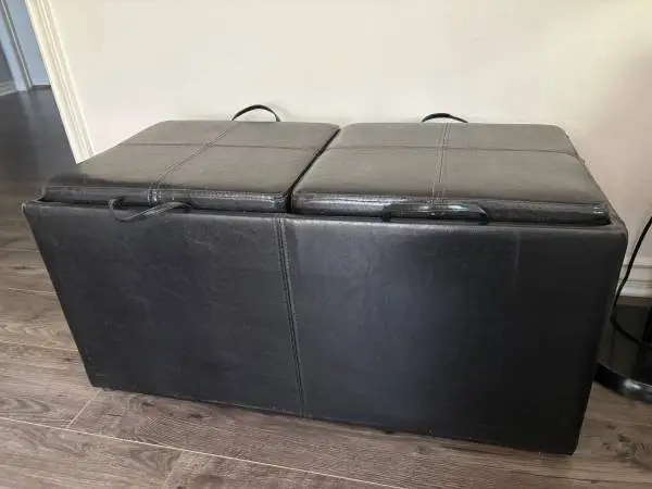 black faux-leather storage bench/ottoman set with two matching stools