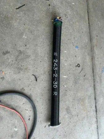 Garage door spring new #243-2-30R bought an extra by mistake Please text with