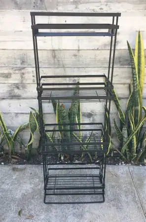 Black Metal Enclosed Shelves Rack