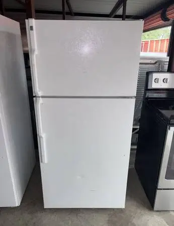 White GE Refrigerator And Freezer
