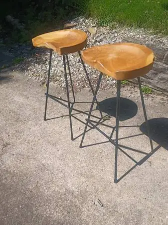 Pair of walnut and wrought iron stools